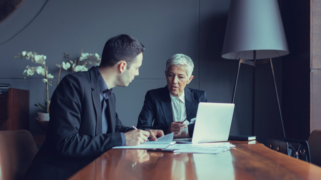 Formal business meeting with two persons